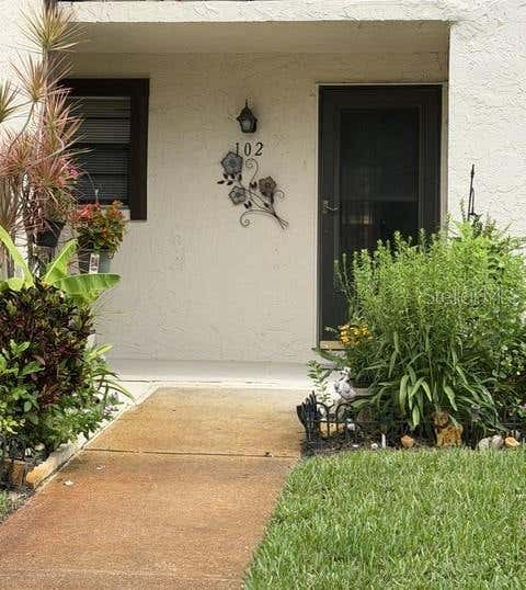 Photo of 2400 Winding Creek Boulevard #24-102, Clearwater, FL 33761 (MLS # TB8534466)
