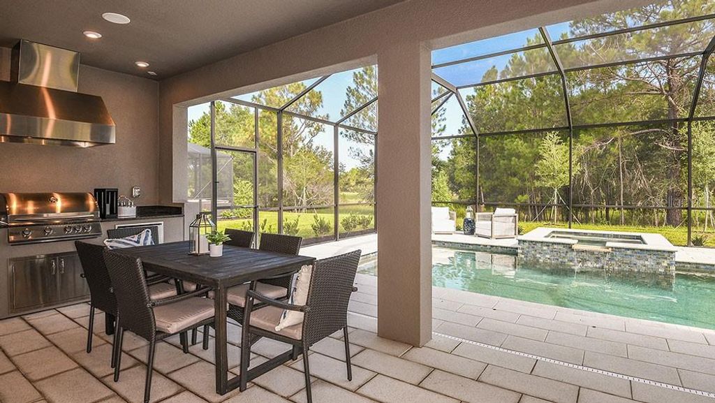 Photo of 33314 Castaway Loop, Wesley Chapel, FL 33543 (MLS # O6370316)