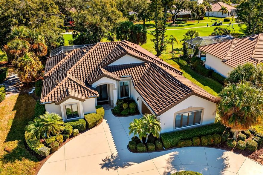 Elegant Golf Course Retreat in Rosedale Golf & Country Club - Welcome to this light-filled 2 bedroom (very possible 3 bedroom), 2 bathroom home with den, with 567 sq ft, oversized garage! Located in the highly sought-after Rosedale Golf & Country Club right on the 7th fairway with a wall of windows for great views. A generator and hurricane shutters give you peace of mind. The spacious primary suite offers a relaxing retreat with ample room to unwind, while the den with custom built-ins provides the perfect space for a home office or reading nook. Formal living and dining rooms, along with an additional family room, make entertaining effortless and allow everyone to spread out comfortably. The oversized garage ensures plenty of storage for vehicles, golf carts, and more. Step outside to your private backyard oasis where you can enjoy easy Florida living all year round. Enjoy your sparkling pool with spa, entertain guests at the fully equipped outdoor kitchen, and take in the serene golf course views—all while maintaining a sense of privacy. With timeless finishes, a thoughtfully designed floor plan, and an unbeatable setting, this home embodies the Florida lifestyle at its finest. Rosedale’s master HOA includes 2 manned-gates, 2 dog parks, care for the common area/lakes/roads, internet, cable and mailboxes. Rosedale is close to it all including downtown Bradenton, Sarasota, St. Pete or Tampa – and is a gated community offering a lock and leave flexibility for seasonal residents, and an active lifestyle. Membership at the club is optional in this area of Rosedale, but highly coveted. The club offers a variety of activities including five lighted Har-Tru tennis courts, an 18-hole championship golf course, a Junior-size Olympic swimming pool and a state-of-the-art wellness center. The recently modernized clubhouse offers a dining room, lounge and bistro patio with an extensive menu and friendly members.