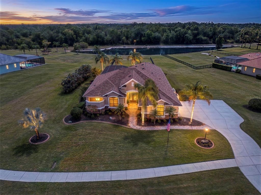 Photo of 3710 Twin Rivers Trail, Parrish, FL 34219 (MLS # TB8495347)