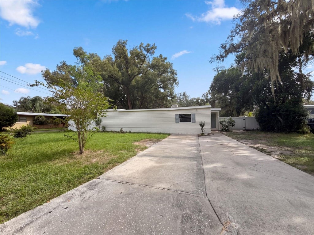 Photo of 409 Berwick Avenue, Temple Terrace, FL 33617 (MLS # O6448360)