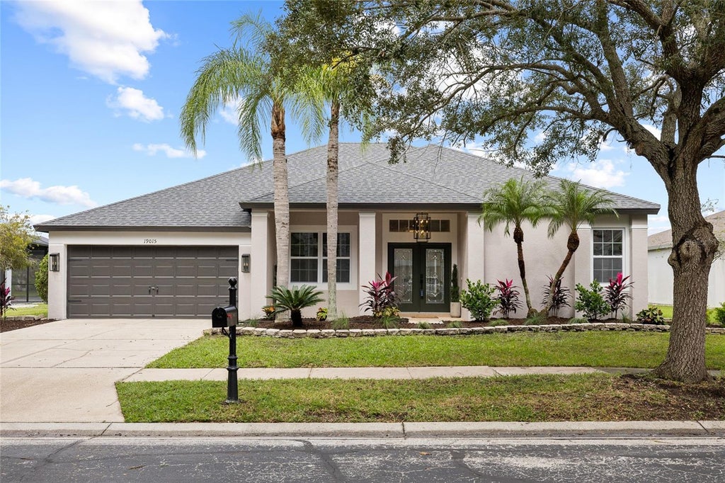 Photo of 19015 Fern Meadow Loop, Lutz, FL 33558 (MLS # TB8556984)