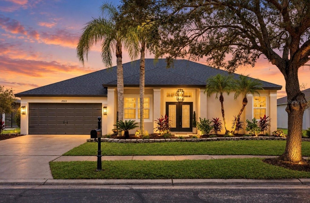 Photo of 19015 Fern Meadow Loop, Lutz, FL 33558 (MLS # TB8556984)