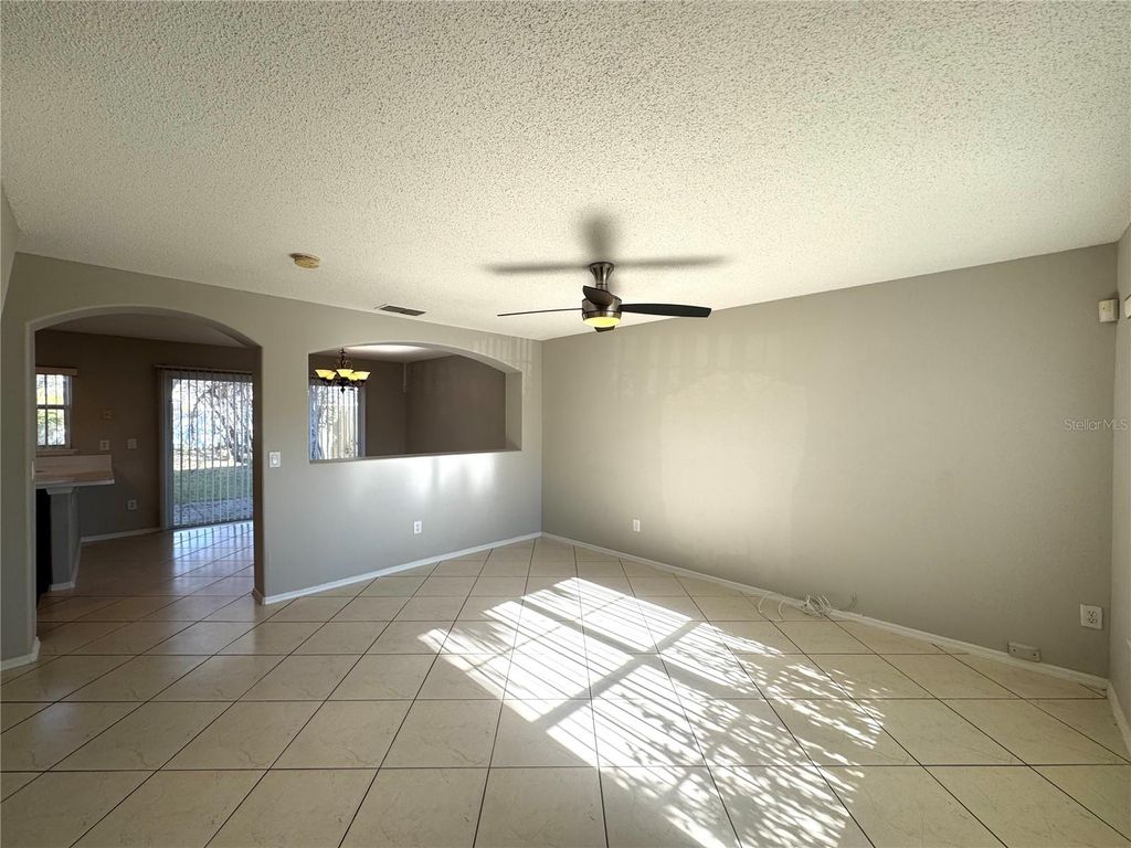 Photo of 14328 Rainsong Drive, Orlando, FL 32824 (MLS # O6361870)