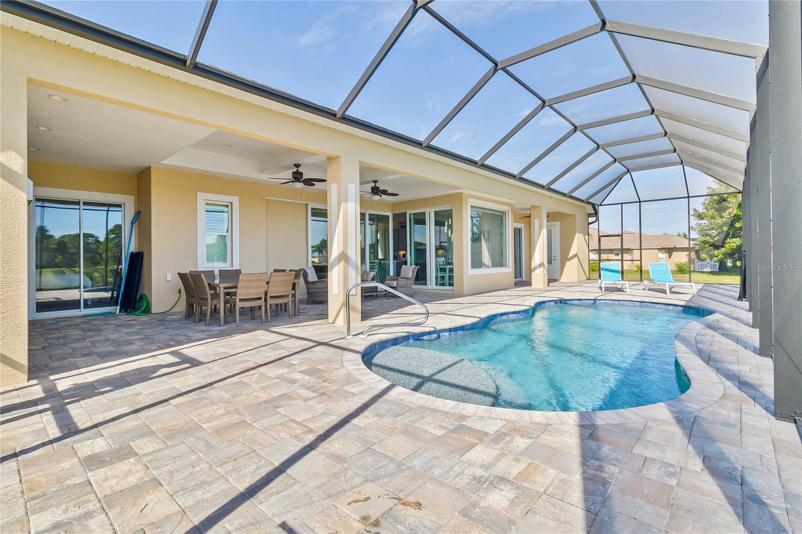 Hey there snowbirds we have December and January open and only require a 14 day minimum stay!
Breakaway for a relaxing stay in this gorgeous pool home that exudes elegance. Brand new construction and the Owner has thought of everything to make your vacation comfortable and relaxing. Your time primarily will be spent outdoors floating away in the pool, sunning on the deck, preparing meals in the outdoor kitchen or casting a line in the backyard canal. The Rotonda community is surrounded by 4 golf courses and just a short drive to the gorgeous beaches of Manasota Key.Located in the deed restricted community of Rotonda, this home is just a short drive to retail, grocery and dining. As you arrive you will be taken by the sophisticated aesthetic and pristine maintenance of the property. The stately, glass plated doors allow the home to fill with natural light. Rest and rejuvenate the spirit for a two week jaunt or stay with us for an extended length. Tasteful and thoughtful finishes provide an environment where you will feel right at home. The modernly styled kitchen is equipped with everything you may need to prepare a 7 course meal (but don't, you should be relaxing)! Equipped to comfortably accommodate six guests. Dine inside looking out to the pool or throw open the sliders and expand your living space outdoors. This lanai is amazing. Blow up the rafts and float your days away listening to the sounds of Mother Nature coming from the canal behind. Great opportunity to cast a line. These waters are fertile. Plenty of space poolside or along the sandbar to soak in the Vitamin D. For those who prefer shade, plenty of overhead cover as well. Fire up the propane grill in the outdoor kitchen let the BBQ master take over. The convenience of a full pool bath on the lanai. The master suite is split away from the guest bedrooms and provides a peaceful retreat at the end of the day. Slumber comfortably in the King sized accommodations. Three shower heads in the expansive shower to massage your cares away. Each guest bedroom has queen sized bedding that is equally comfortable. Wake up well rested and ready to tackle the adventures of the day. Strong Wi-Fi signal for those working remotely. Smart tv's in both the living room and master bedroom with a cable package. Many unique shopping and dining experiences close at hand. Grab the beach towels and sunblock and it is just a short drive to the gorgeous Manasota Key beaches. Great swimming, shelling and shark tooth hunting opportunities about. Kayak rentals, boat rentals, parasailing can all be found along Beach Rd. Live music and waterfront dining as well. You are certain to want to book your next stay before departing. Pool can be heated the cooler months of the year. The pool heat fee is $20 per day. 14 day minimum stay.