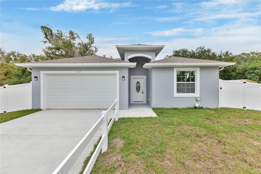 Discover this beautifully built 4-bedroom, 2-bath home—brand new construction and no HOA, offering freedom and modern comfort.

As you enter, you’re welcomed into an airy, open living space designed for easy everyday living. The kitchen sits at the heart of the home, featuring sleek cabinetry, stainless steel appliances, and plenty of room for meal prep and entertaining.

The primary suite is thoughtfully positioned for privacy, offering a relaxing retreat with its own well-appointed bathroom and dual sinks. Three additional bedrooms provide room for family, guests, a home office, or a hobby space—whatever fits your lifestyle.

Step outside to a fully fenced backyard, giving you a private outdoor area perfect for weekend gatherings, pets, or simply unwinding in the Florida sun.

Move-in ready and designed for low-maintenance living, this home is the perfect blend of style, space, and convenience.