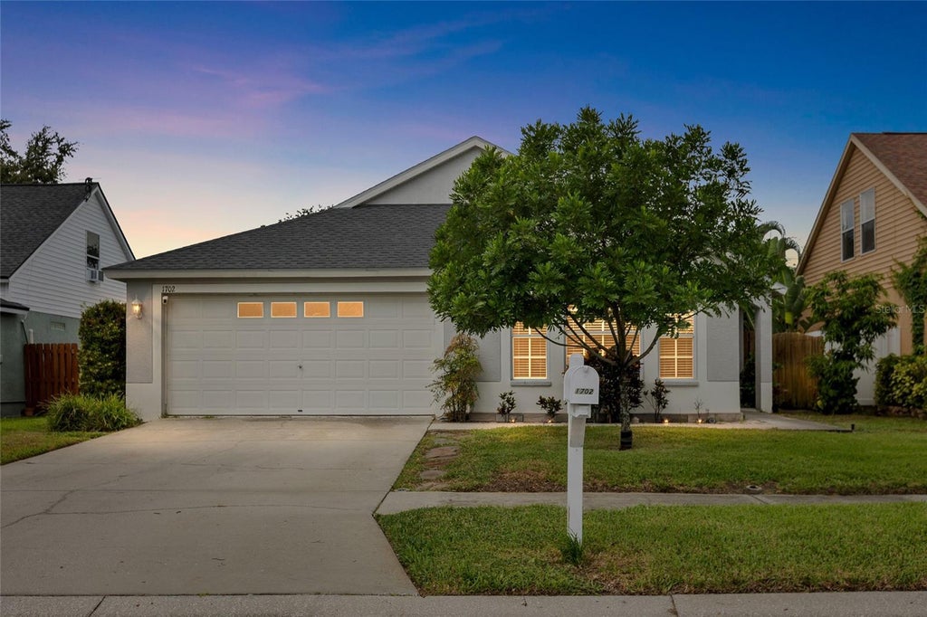 Photo of 1702 Meadow Oak Lane, Tarpon Springs, FL 34689 (MLS # TB8543027)