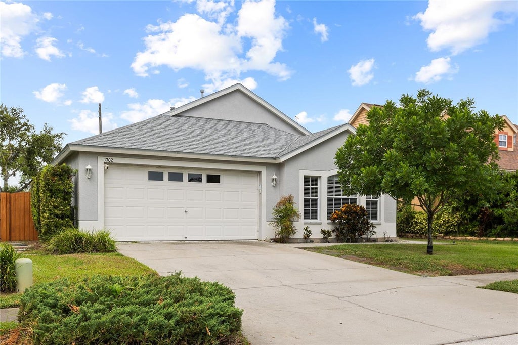 Photo of 1702 Meadow Oak Lane, Tarpon Springs, FL 34689 (MLS # TB8543027)