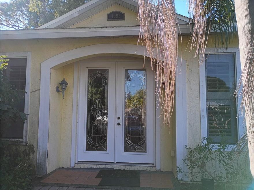 Price to sale!!! 2,252 Heated Sq-Ft home located near all schools, Howard Park & beach and Sunset Beach. Not in flood zones. 2B,2B plus
library/bonus room, dining room/ kitchen combo, and a beautiful Living room 23 x 11 ft with cathedral ceilings. Double doors entrance & large
foyer. Wood floor all through the home, tile floor in foyer & bathrooms. Roof is 3 years old. Stainless steel appliances. New range. Granite
counter Tops. French doors & windows were replaced. Need TLC. Painting inside/out, Yard work and on the 36x8 ft porch.