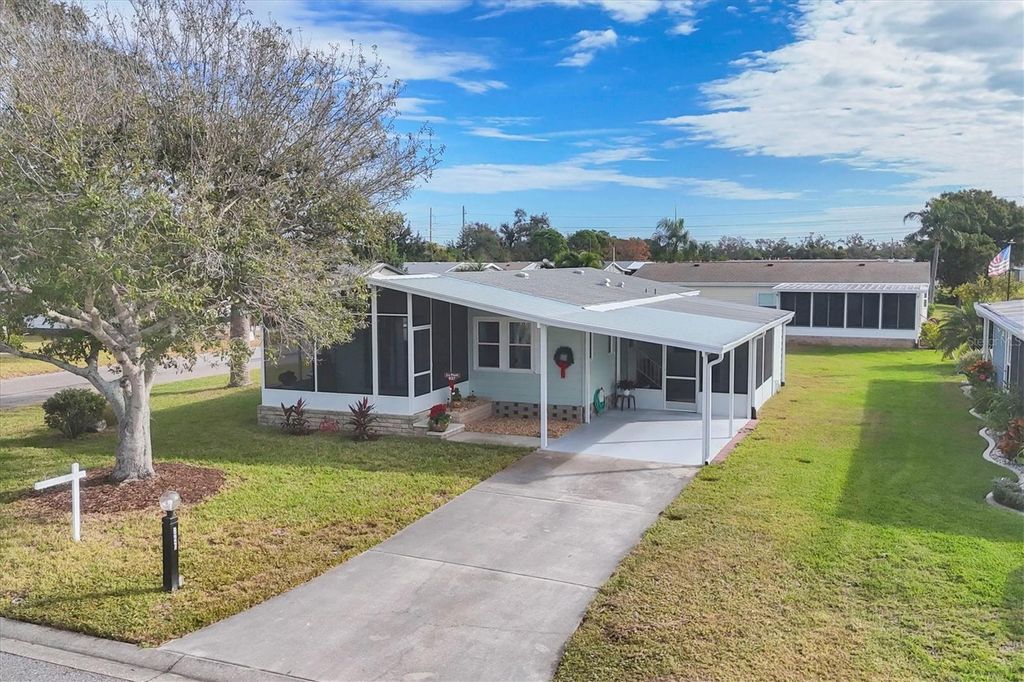 Photo of 827 Tangerine Woods Boulevard, Englewood, FL 34223 (MLS # D6144719)