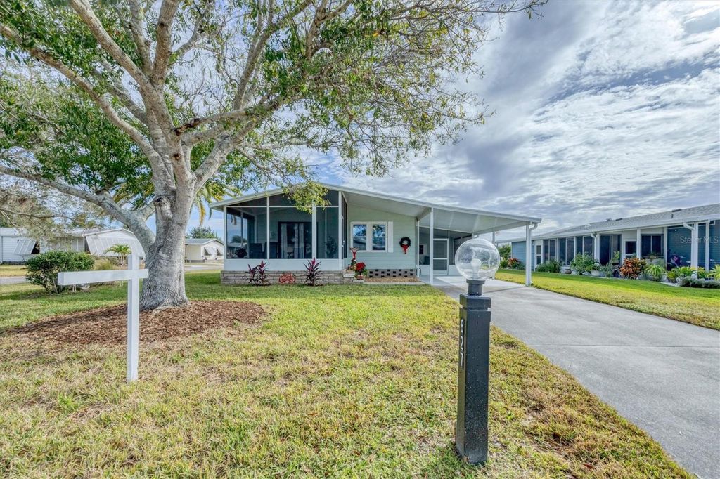 Photo of 827 Tangerine Woods Boulevard, Englewood, FL 34223 (MLS # D6144719)