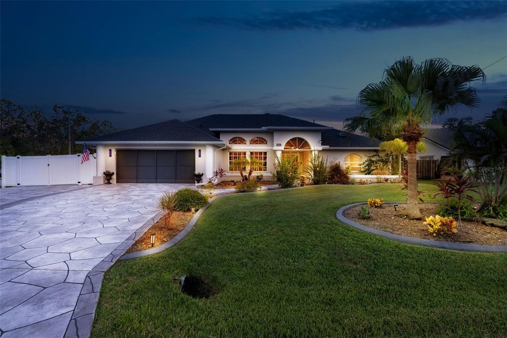 Photo of 23529 Dean Avenue, Port Charlotte, FL 33954 (MLS # C7530694)