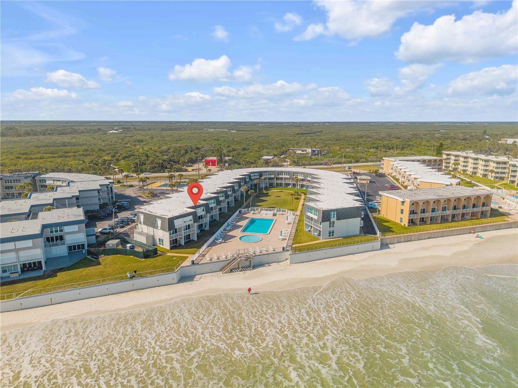 Photo of 4831 Saxon Drive #203, New Smyrna Beach, FL 32169 (MLS # NS1087105)