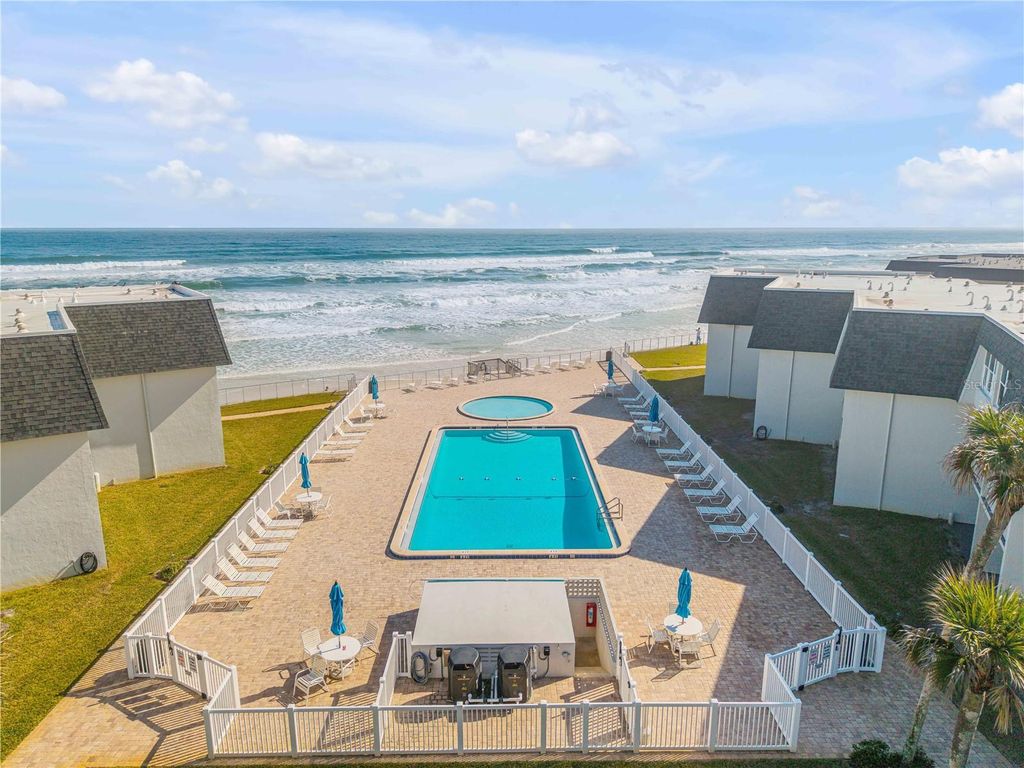 Photo of 4831 Saxon Drive #203, New Smyrna Beach, FL 32169 (MLS # NS1087105)