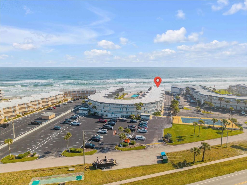 Photo of 4831 Saxon Drive #203, New Smyrna Beach, FL 32169 (MLS # NS1087105)