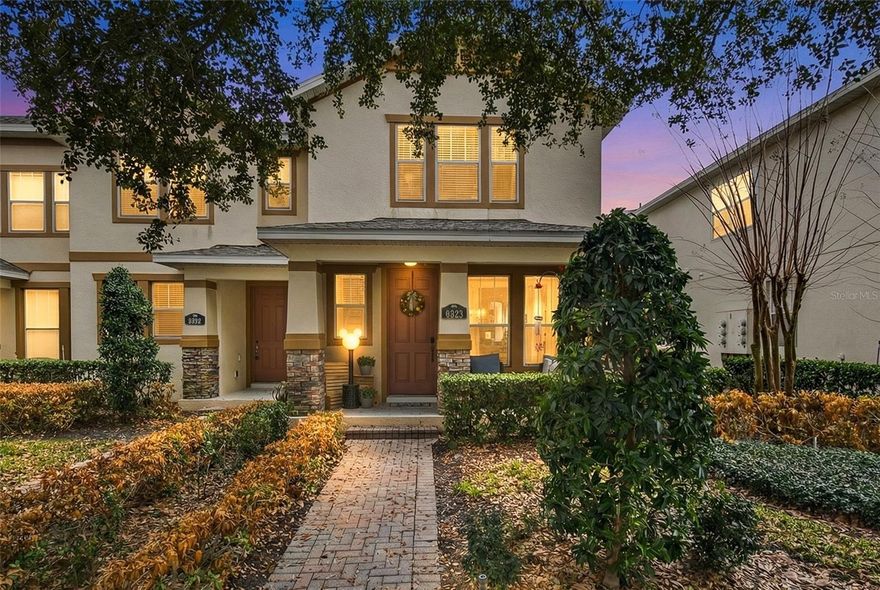 Move-in ready and located in the highly sought-after Independence at Signature Lakes, this beautiful end-unit townhome offers 3 bedrooms, 2.5 baths, and over 1,500 square feet of bright, upgraded living space. The end-unit location provides extra windows and abundant natural light throughout, creating an open and inviting feel.

Recent improvements include a new roof in 2025, luxury vinyl flooring upstairs, and ceramic tile downstairs with no carpet anywhere, plus upgraded stair treads with capped edging. The open-concept main level is perfect for everyday living and entertaining. The kitchen features granite countertops, 42-inch solid wood cabinets, stainless steel appliances, tile backsplash, pendant lighting, and a breakfast bar that opens to the spacious family room with oversized picture windows and sliding glass doors leading to the patio.

The sun-filled front room offers flexible use as a dining area, sitting room, or home office. Upstairs, enjoy new luxury vinyl flooring and a light-filled primary suite with a newly renovated spa-style bath featuring mirrored barn doors, granite vanity with extra storage, and a beautifully tiled walk-in shower. Primary walk-in closet with built-ins! All bedrooms benefit from the additional natural light only an end unit provides.

Outdoor living shines with a large fenced brick-paver patio, ideal for relaxing or entertaining while enjoying evening skies and distant fireworks from Walt Disney World Resort. A two-car garage plus driveway parking adds everyday convenience.

The HOA provides true low-maintenance living, covering cable, high-speed internet with streaming, roof replacement, exterior painting scheduled for April 2026, landscaping, and interior and exterior pest control. Residents enjoy walking trails, swimming pool, fitness center, parks, two boat ramps, fishing, billiards, game room, and a full-time activities team hosting complimentary community events throughout the year.

Situated in a top-rated A school district and close to shopping, dining, and major attractions, this home is also less than one mile from the new Horizon West Regional Park, a 215-acre regional park currently under development.

With stylish finishes, outstanding amenities, and a prime Horizon West location, this exceptional townhome truly checks all the boxes. Schedule your private showing today. This home must be seen to be fully appreciated.