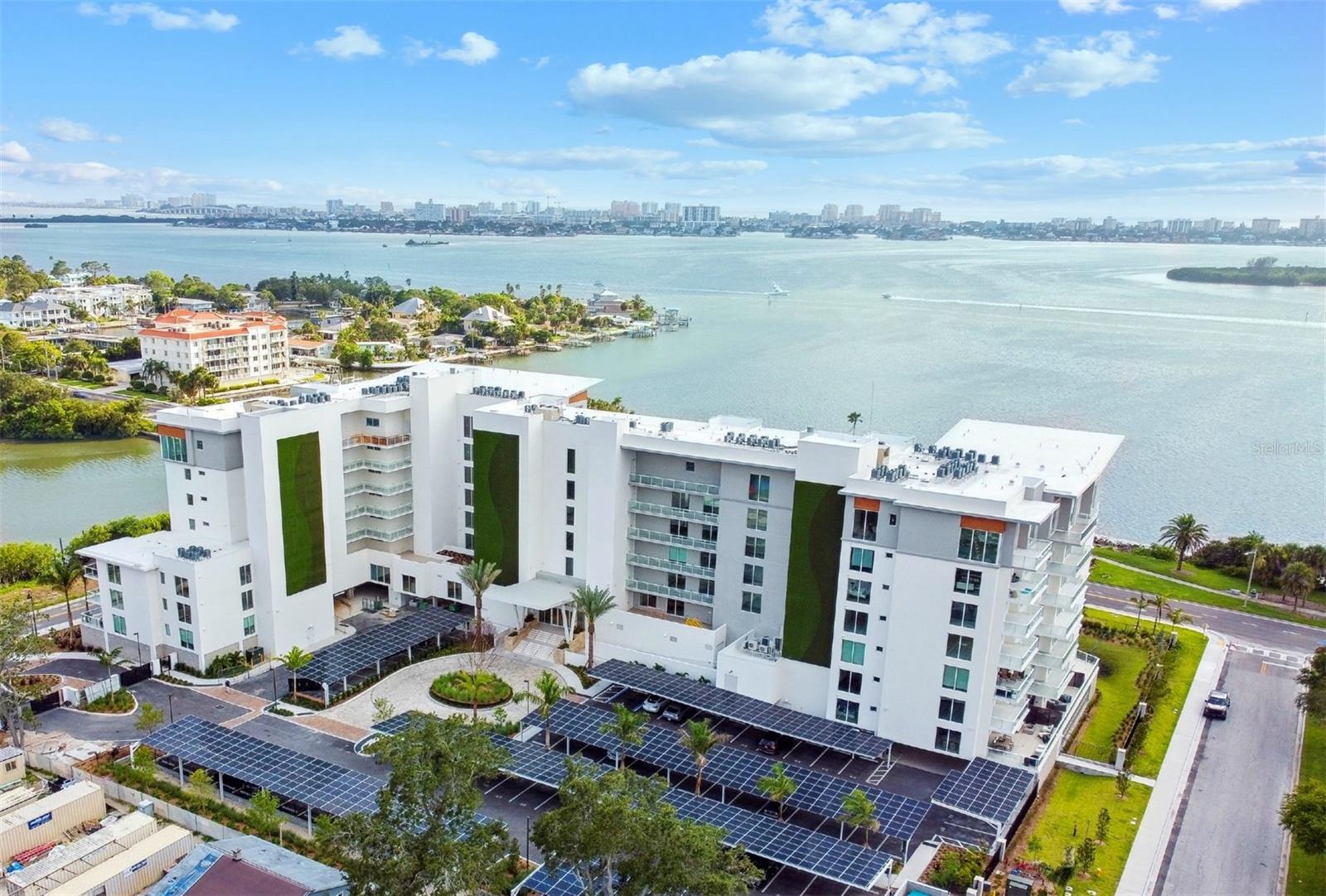 Improved Price for this stunning unit available for a 6 month lease! This is one of a kind TURN KEY, move-in ready unit in Clearwater's Premiere Luxury Waterfront development Serena by the Sea. In addition to its stunning design and top-of-the-line features, this 2-bedroom unit enjoys a sprawling private outdoor patio providing over 400 SqFt of outdoor entertaining space. Inside the home you'll find a gorgeous kitchen with a 10' long waterfall Quartz island, Gaggenau Gas Stove, Built-in Oven, Paneled Fridge, and custom designed Italian cabinetry. This naturally bright unit is designed with brand new high end furnishings from suppliers like Restoration Hardware and Crate and Barrell - offering its resident the perfect blend of comfort and luxury. This home has it all, you don't need anything other than your suitcase! Large format porcelain tile in living areas and patio, and engineered hardwood floors in the bedrooms. The bathrooms have floating vanities, and LED touch mirrors. Resident enjoys access to the best life has to offer with Serena by the Sea's 23,000 Sq Ft of luxurious amenities - State of the art gym including Peloton treadmill, Peloton bike and Lulu lemon mirror - Spa, Sauna, and massage room for ultimate relaxation - Hair salon suite for your convenience Fresh water bucket shower and jacuzzi for rejuvenation - Edge saltwater pool with cabanas and outdoor summer kitchens area for entertainment - Gas fire pit for cozy evenings - Game room and theater room for entertainment - Social room for gatherings and events - Solar panels powering common areas - 24/7 concierge and gated community for security and convenience. 1 parking space and 1 storage unit.