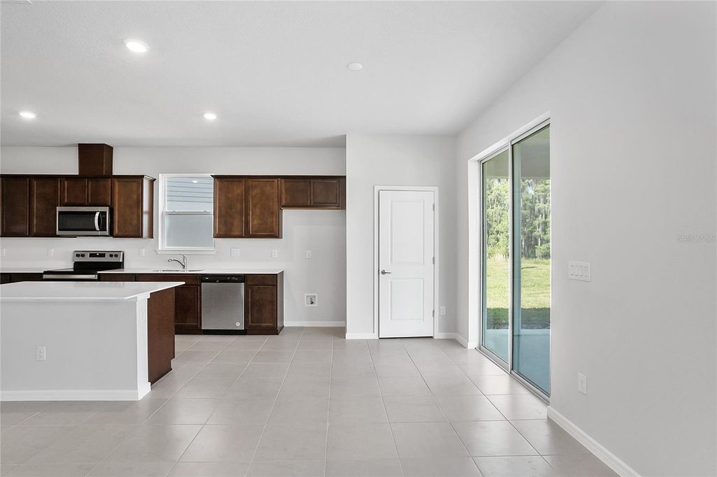 Photo of 10822 Windswept Garden Way, Tampa, FL 33647 (MLS # TB8347701)