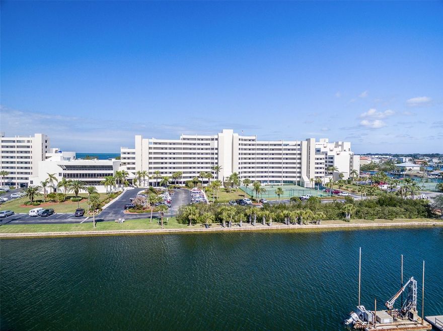 Stunning 2 bedroom 2 Bathroom uninhibited view of the GULF with amenities galore including your VERY OWN PRIVATE DOCK!!!!!!! Hurry, this LISTING will not last but check out this open concept condo with a balcony to spend forever gazing at Sunsets!! You will instantly fall in love with this Luxurious Home with Maintenance Free living and and endless list of amenities including a private beach access, Olympic Sized Heated Pool, Fitness center, Community Activity area with a Dance Floor, Tennis & Pickleball courts, walking trails, game room and private lagoon area for fishing & dolphin watching! Enjoy sitting on your large balcony watching the Nature & Wildlife of the Gulf!!! Income potential for seasonal renting and great place to have family & friends come and visit!! 
This Home comes with Oversized covered parking space, storage, and more! Open Concept kitchen with new Butcher Block Countertops is a Chef's dream. Check out the fully updated Primary Ensuite with Spa-Like Walk in Shower!! 
This is a very active community hosting fun events every month so there is never not something to do!!  Just minutes away includes incredible Gulf-front restaurants, shopping, top medical facilities & Center, Theaters, Breweries & Wineries, Professional Pickleball facility, Weeki Wachee Springs, Hudson Beach & Marina, Buccaneer Bay, Kayak & Canoeing, Boating, Top Fishing, Golfing, hiking and more. This is an ideal property for income producing as well as a getaway from those Cold northern states and snow covered roads!!! Feel secure with your 24 hour gated community with Guard Shack. Your Association fee includes Water, Trash, Spectrum cable TV and in-unit Wi-Fi! 
This community has undergone many improvements recently including entrance flooring, new elevators, roof improvements (post storms), new pool liner and furniture, new carpeting in the clubhouse areas and repaved parking lots. Updated, Luxurious, Maintenance Free, Relaxing, Active Community with endless amenities.... This Home has it all including a VERY MOTIVATED SELLER!!!! Schedule your showing today!!