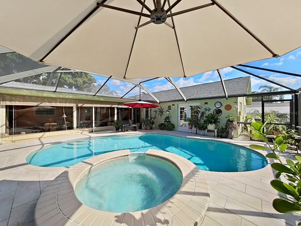 Photo of 169 Foxcroft Drive W, Palm Harbor, FL 34683 (MLS # TB8558377)
