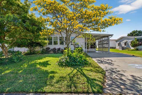 Photo of 6502 Oak Hammock Lane, Winter Haven, FL 33884 (MLS # P4936840)