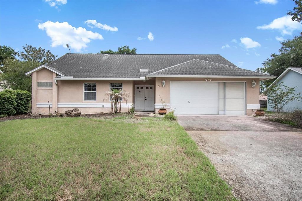 Photo of 50 Westover Drive, Palm Coast, FL 32164 (MLS # FC318479)