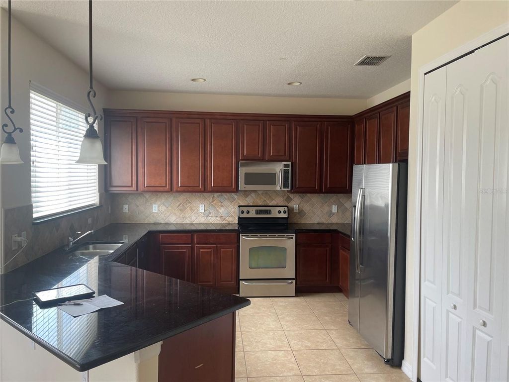 Photo of 13241 Hatherton Circle, Orlando, FL 32832 (MLS # O6398091)