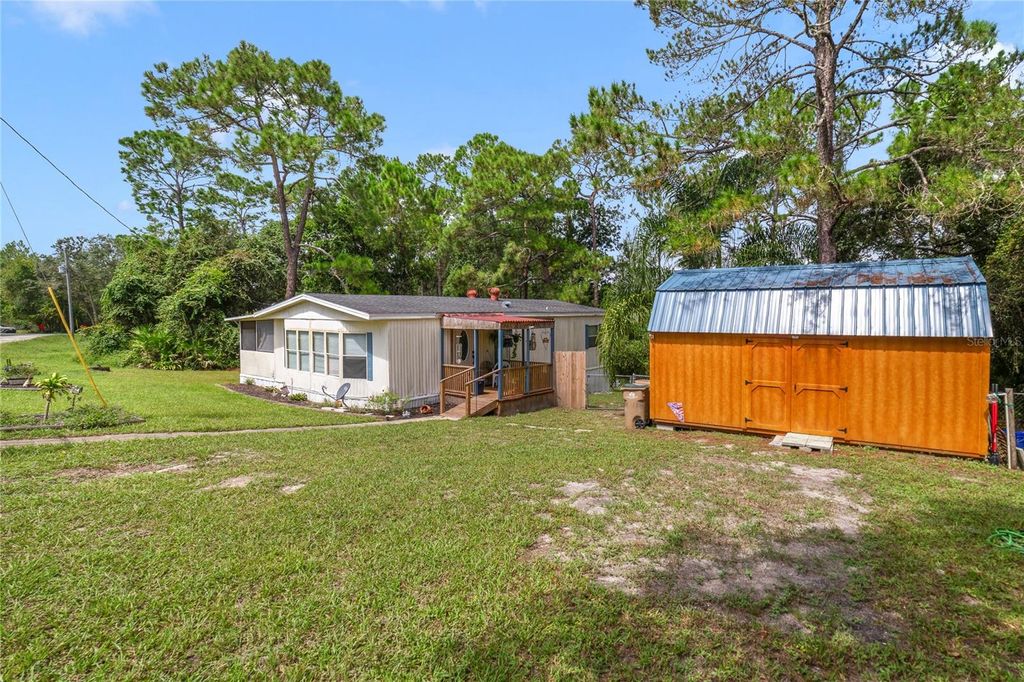 Photo of 44651 Twilight Trail, Deland, FL 32720 (MLS # V4944881)