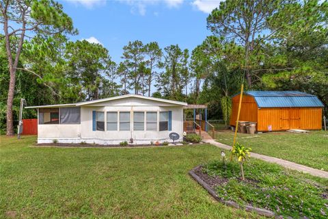 Photo of 44651 Twilight Trail, Deland, FL 32720 (MLS # V4944881)