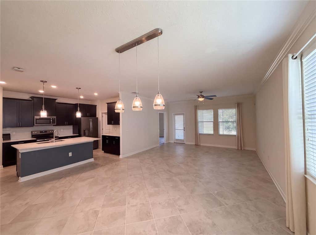 Photo of 4112 Innovation Lane, Clermont, FL 34711 (MLS # O6431059)