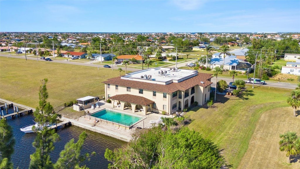Photo of 1217 Aqui Esta Drive #5, Punta Gorda, FL 33950 (MLS # C7530519)