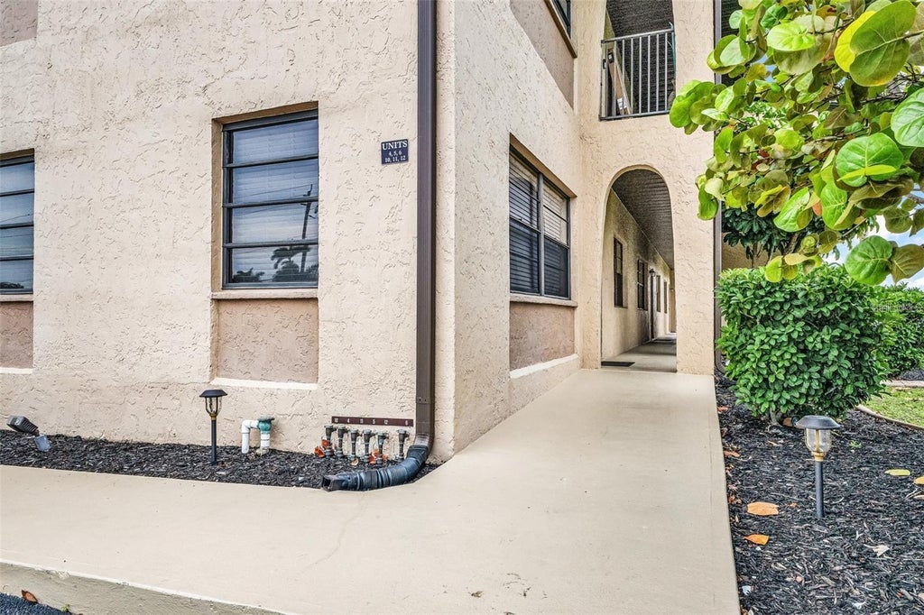 Photo of 1217 Aqui Esta Drive #5, Punta Gorda, FL 33950 (MLS # C7530519)