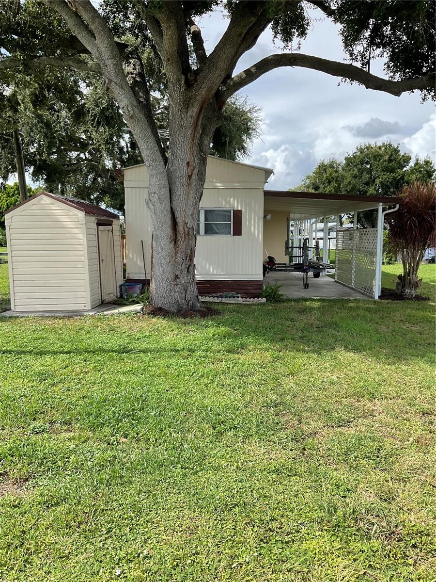 Buck Head Ridge -Lake Okeechobee Access- Canal Front 1971 2-bedroom -1 bath SWMH built by Fleetwood- located on dead-end street-just minutes to Lake Okeechobee- Metal roof and metal skirting- Covered Patio, Laminate Flooring-Central Heat and Air- Mature Landscaping -Good Seawall - Large Boat slip- Sprinkler system off canal- solid wood cabinets- Open floorplan with great view of water- Property being sold turnkey! Property needs a little work. Call for more information. All measurements approximate.