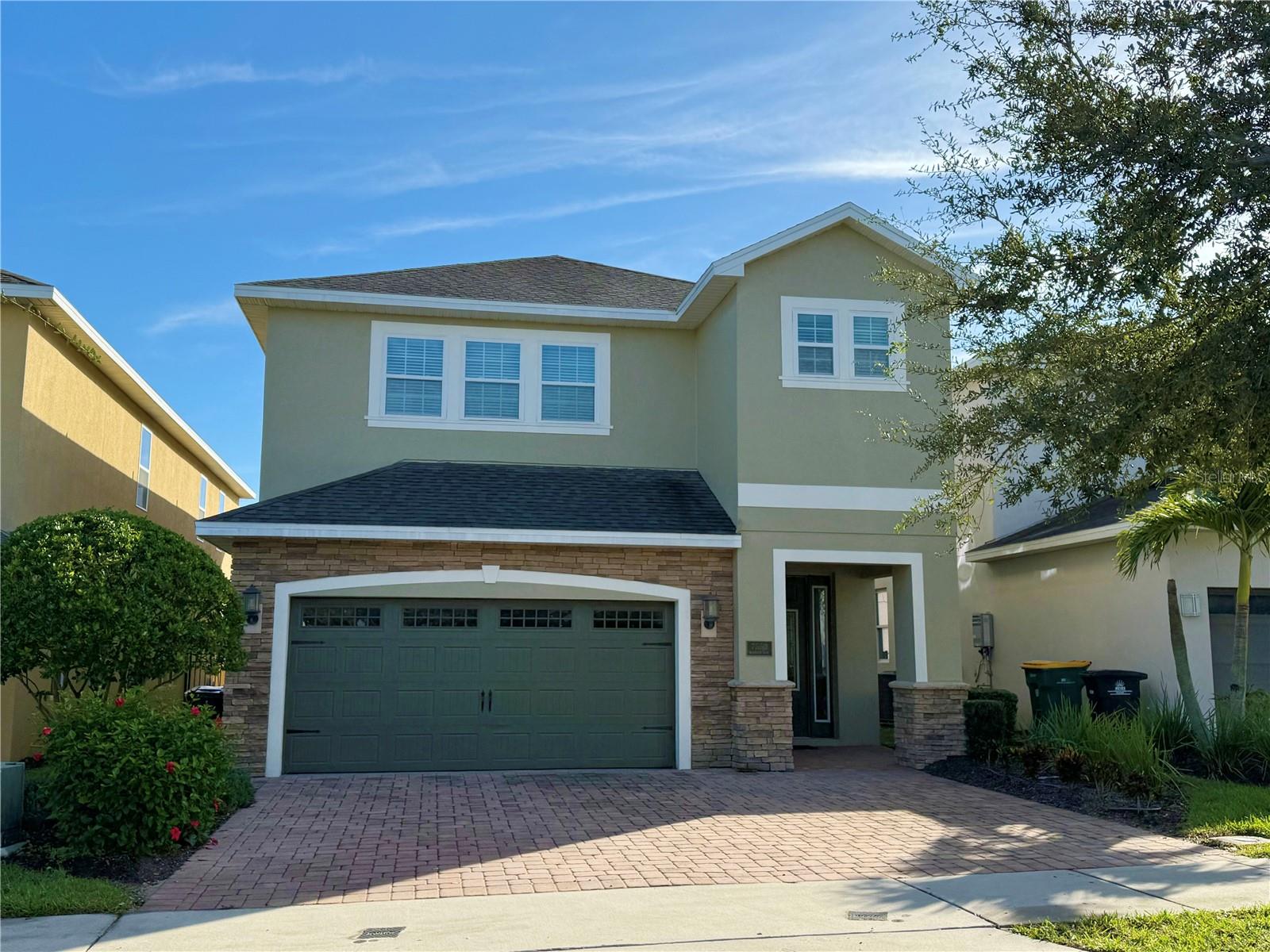 Discover the epitome of luxury vacationing at this exquisite 6-bedroom, 6.5-bathroom single family home nestled within the prestigious Encore at Reunion Resort community. Boasting an open floor plan, this home features stainless steel appliances, including two dishwashers and a wine refrigerator in the kitchen, granite countertops, complemented by modern furniture (Included in the price). The spacious lot offers great potential in addition to the sensational pool, spa with seating for every guest. , the garage has been cleverly transformed into a captivating game room, perfect for the kids, young and old. Encore at Reunion offers an array of world-class amenities, including a thrilling water park with slides, fitness center, on-site restaurants, a clubhouse, and even a shuttle service to nearby theme parks. This remarkable property invites you to indulge in the ultimate Florida resort lifestyle.