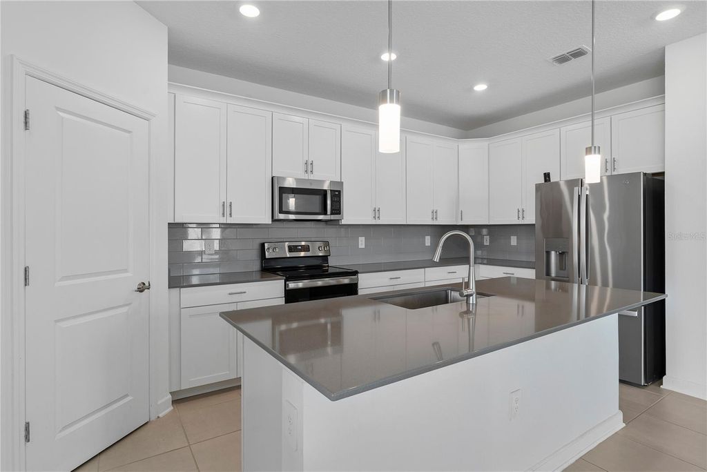 Photo of 4245 Eastminster Road, Davenport, FL 33837 (MLS # O6352022)