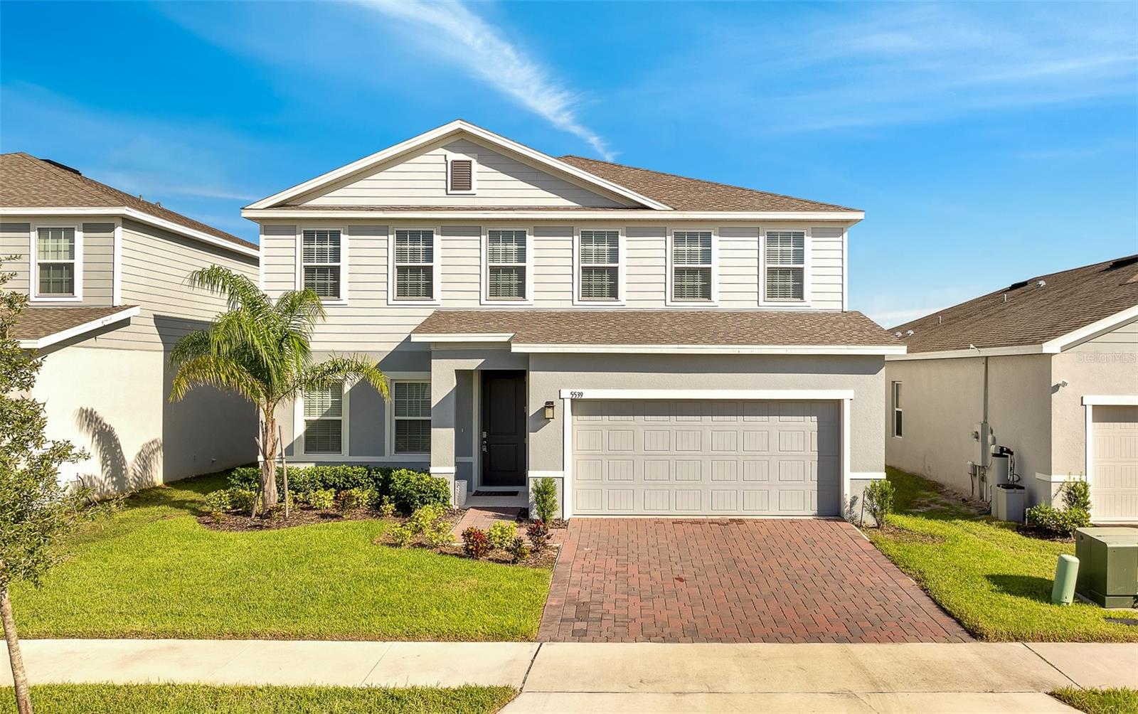 Welcome to your new home in a beautiful, family friendly community with a large FENCED-IN, private backyard outdoor. With 5 bedrooms, 4 baths, an office and upstairs loft, this home has everything you could need. A built-in office/formal dining area add a touch of elegance, while the kitchen opens to a large great room with sliding doors to the expansive covered lanai. The kitchen is a chef's dream, featuring a central island, 42" cabinets, granite countertops, stainless steel appliances (including a double oven and cooktop), and a walk-in pantry. The master suite offers a generous walk-in closet with additional storage space and a luxurious master bath with a private lavatory, dual vanity sinks, a garden bath with a soaking tub, and a glass-enclosed shower. The secondary bathrooms also boast granite countertops. This home is designed with energy efficiency in mind, featuring R-38 insulation, and a hybrid water heater to keep utility bills low. The community amenities include a pool, picnic pavilions, and playgrounds.