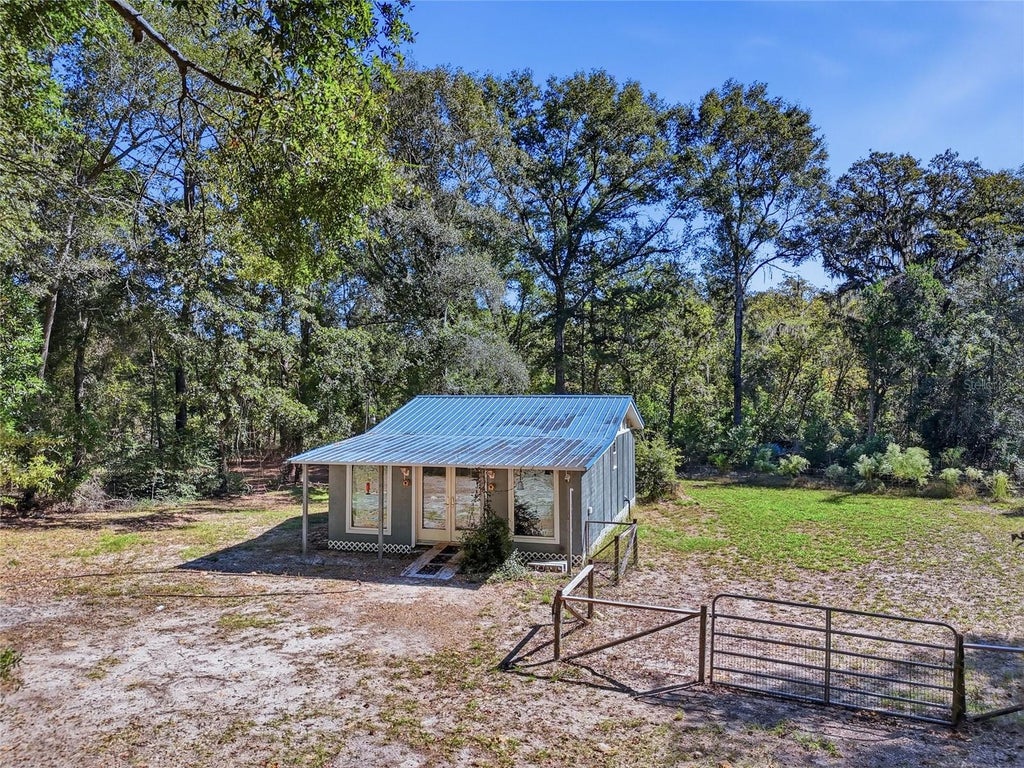 Photo of 3228 SW Wilson Springs Road, Fort White, FL 32038 (MLS # GC544389)