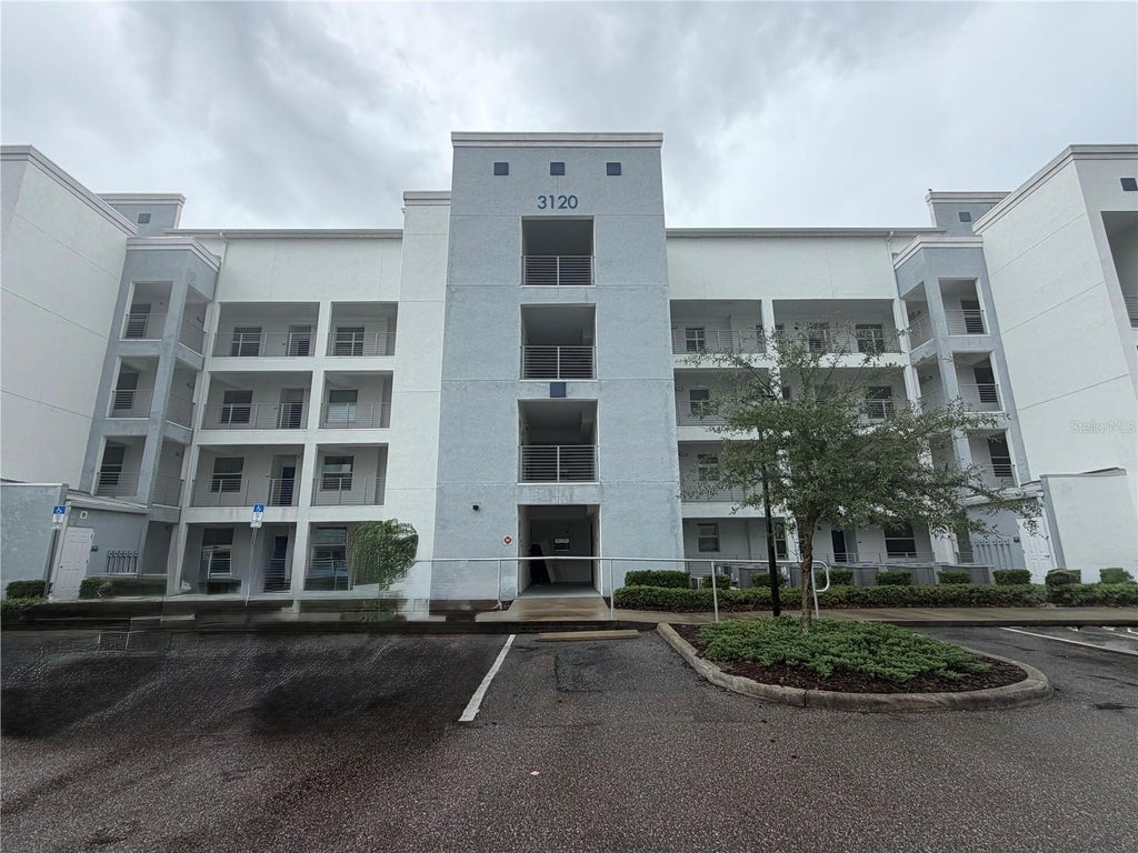 Photo of 3120 Paradox Circle #307, Kissimmee, FL 34746 (MLS # S5157572)