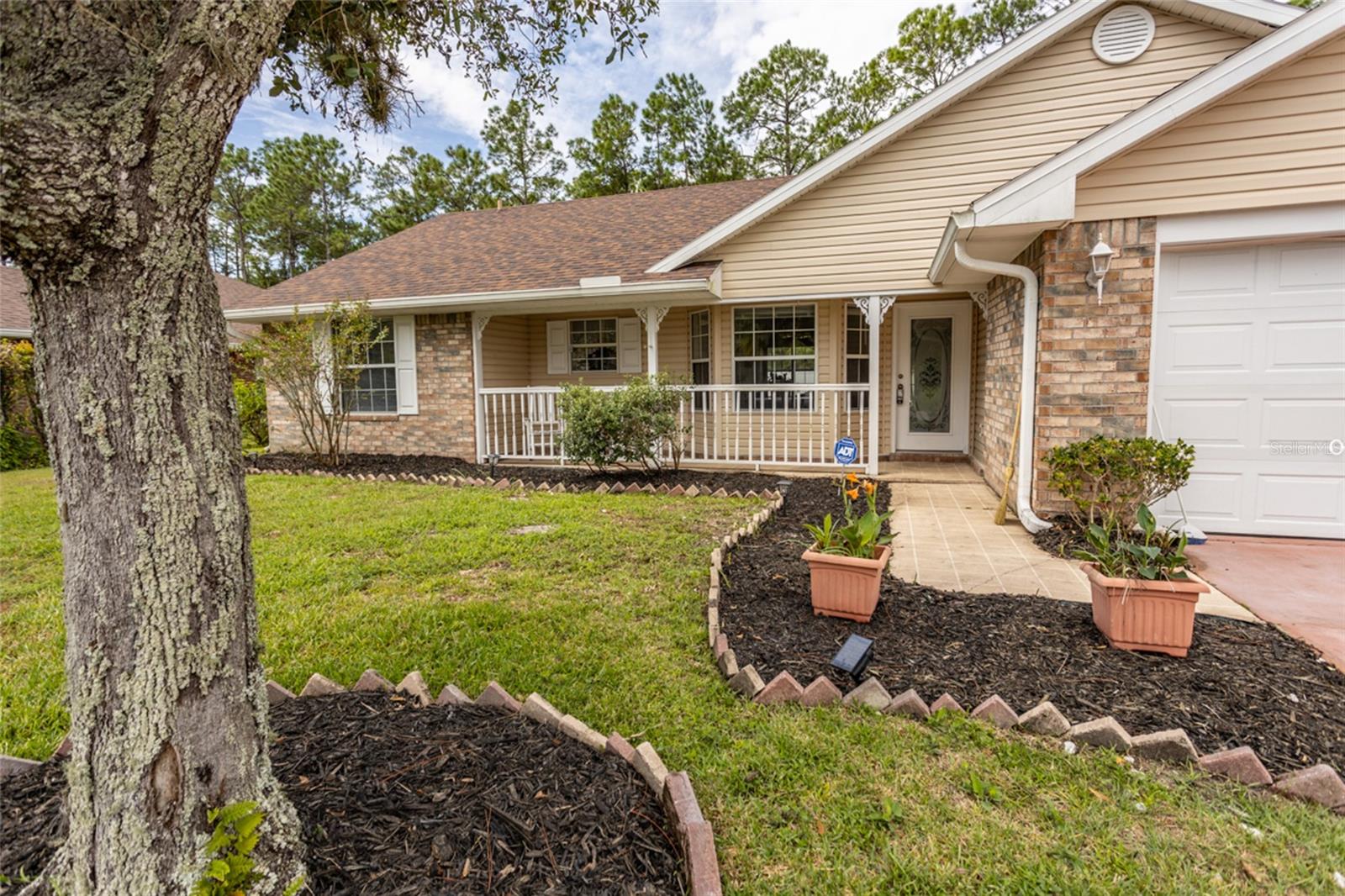 Wow! Three bedrooms, two bathrooms, single-family home located in the "W" section of Pine Lakes in Palm Coast. Split bedroom floorplan. Laminate flooring throughout the living, kitchen & dining areas. Inside the laundry room. Vaulted ceilings. Roof 2022. Fenced-in yard. Mature fruit trees. Roof 2018, AC 2022, & fence 2022. Most big-ticket items have been updated!! Near golf course, schools, shopping & medical