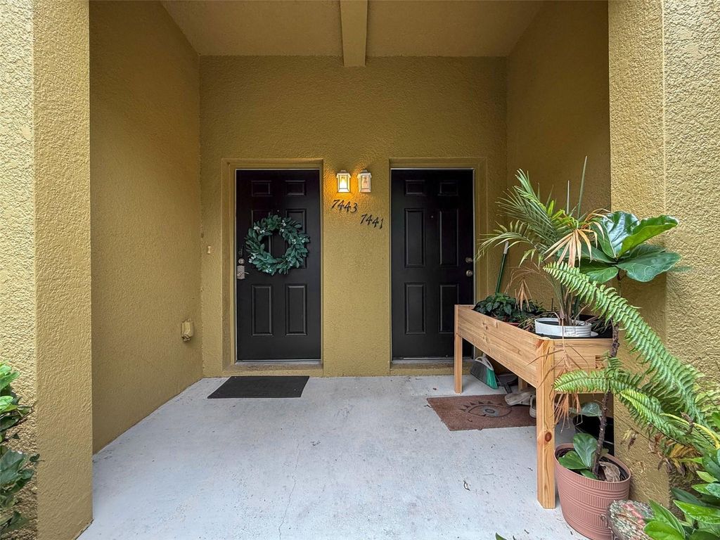 Photo of 7443 Arlington Grove Circle, Tampa, FL 33625 (MLS # O6347950)