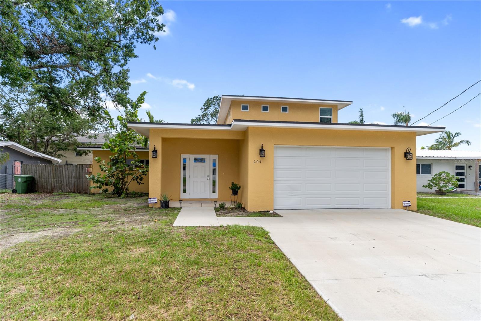 This beautifully remodeled 3-bedroom home has everything you’ll love—light, bright, and welcoming throughout. NO HOA! Step into the inviting front entry and be greeted by soaring ceilings, elegant crown molding, and stunning new flooring that flows into a modern, beautifully designed kitchen and expansive living area. The newly added upstairs master suite is a true retreat, offering a massive walk-in closet, a luxurious bathroom, and panoramic views of the Manatee River through large windows and from your own private balcony. Nearly the entire property was renovated in 2023 and added 1000 sq feet extra to bring this home to 2568 sq feet of living space. Enjoy total peace of mind with all-new hurricane-impact windows, a new roof, updated electrical and plumbing, and two new A/C systems. The home also features a convenient a main floor half bath, main-floor laundry, and a versatile bonus room that can serve as a fourth bedroom, home office, or hobby space. Outside, the fenced yard keeps pets safe and includes a 10x10 storage shed for added convenience. Ideally located just minutes from downtown, the interstate, and a short drive to the beaches, this thoughtfully upgraded Florida home offers comfort, style, and lasting quality in every detail.
