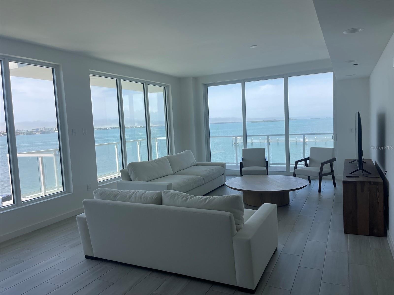 Experience luxury coastal living in this fully furnished, move-in ready beachfront condo with breathtaking, unobstructed views of the Gulf of Mexico and iconic Clearwater Beach. Designed for both comfort and style, this residence boasts a spacious open floor plan, floor-to-ceiling glass, and elegant designer furnishings.
The gourmet kitchen is equipped with top-of-the-line appliances, while spa-inspired bathrooms and generously sized bedrooms. Step out onto the expansive terrace—perfect for evening sunsets or entertaining guests.
Set within a premier resort-style community, residents enjoy access to a beachfront pool, 24/7 security, and private parking. Located just steps away from award-winning restaurants, boutique shopping, and the vibrant energy of Clearwater Beach.
Whether you're looking for a luxurious seasonal escape or a full-time coastal residence, this condo offers the ultimate Florida lifestyle.