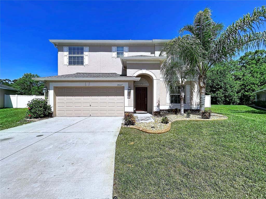 Photo of 18607 Briar Oaks Drive, Hudson, FL 34667 (MLS # TB8538838)