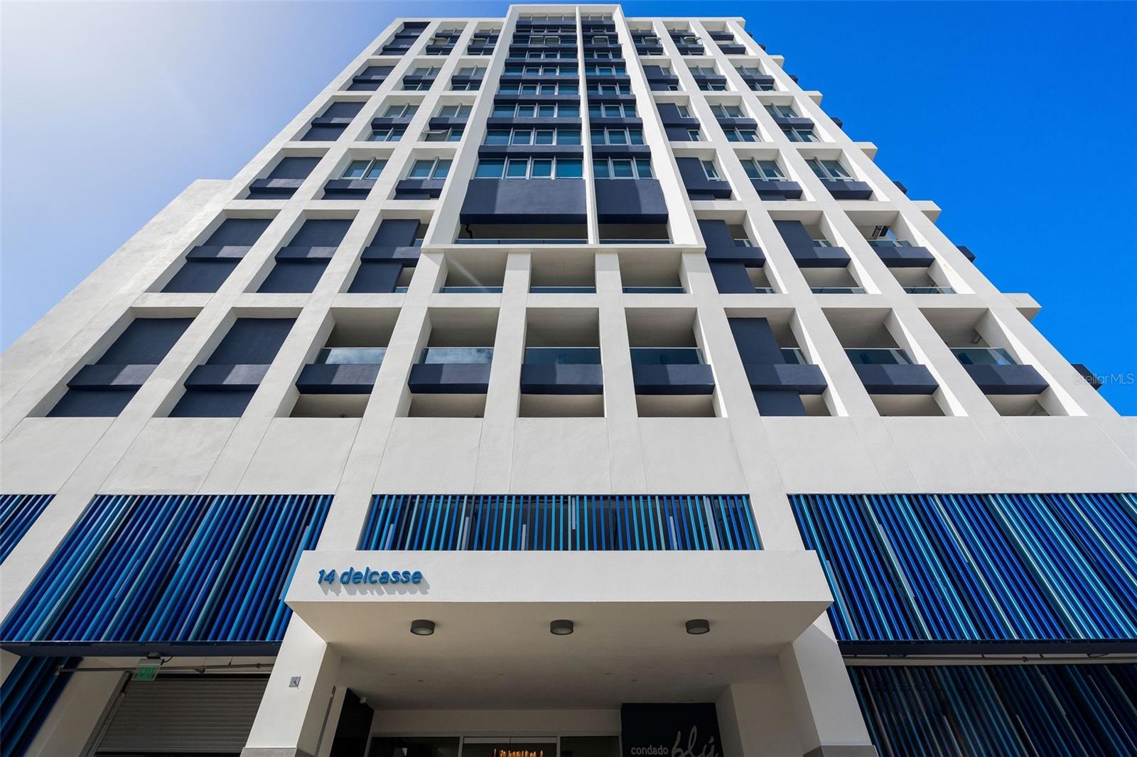 Welcome to Unit #1103 at Condado Blu, an extraordinary lease opportunity in one of San Juan’s newest and most coveted developments. Delivered brand new in October 2024, Condado Blu is an exclusive 14-story masterpiece with only 26 boutique residences, perfectly situated in the heart of Condado. This building redefines modern luxury with breathtaking ocean and lagoon views that immerse residents in San Juan’s vibrant beauty. Positioned just below the penthouse levels, #1103 is one of the highest units available, offering expansive, unobstructed views that showcase the natural splendor of the Caribbean.
Spanning 1,617 square feet, this spacious 2-bedroom, 2.5-bathroom residence is thoughtfully designed with an open-concept layout, seamlessly blending the living, dining, and kitchen spaces. A grand kitchen island with an eat-in bar and high-end kitchen appliances exude elegance and functionality, creating an ideal setting for entertaining or unwinding while floor-to-ceiling windows invite natural light and stunning views into every corner, enhancing the sense of openness and connectivity with the picturesque surroundings. The expansive primary suite features an ensuite primary bathroom with a double vanity and a walk-in closet.
Condado Blu residents enjoy exclusive amenities that set a new standard for luxury in Condado. The rooftop oasis boasts two infinity plunge pools, a shaded terrace, and an outdoor kitchen perfect for al fresco dining, with panoramic views that blend city, ocean, and sky. Residents can also take advantage of a private wine cellar, sundeck with loungers, state-of-the-art fitness center, and a dedicated business center, providing spaces for relaxation, socializing, and productivity. The building prioritizes comfort and convenience with a full back-up generator, water cistern, and high-speed elevators, ensuring uninterrupted service and peace of mind.
Nestled in the vibrant Condado neighborhood, CondadoBlu enjoys excellent accessibility to San Juan's main attractions, entertainment, shopping destinations, schools and essential services. Luis Muñoz Marín International Airport is situated about 5 miles east of CondadoBlu. This proximity makes it ideal for guests and residents who require quick and easy airport access. Plaza Las Américas, the Caribbean's largest shopping mall, is approximately 3 miles away, while The Mall of San Juan, home to luxury retailers and fine dining, is located less than 6 miles from CondadoBlu. This close access to premier shopping and dining enhances the area's appeal for residents and visitors.