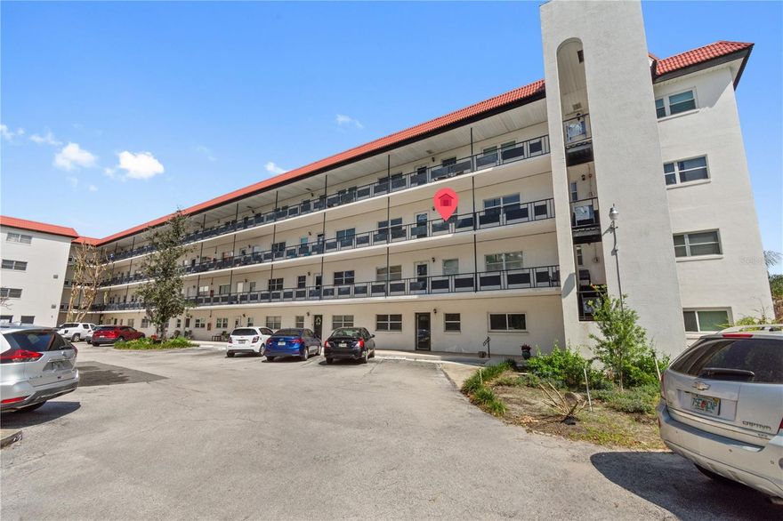 Welcome to this serene 52-unit condominium community, beautifully nestled within a lush, wooded setting. Enjoy peaceful surroundings complete with a tranquil lagoon teeming with birds, otters, and natural wildlife, along with a sparkling community pool that invites relaxation.

This well-maintained 2-bedroom, 2-bath residence offers a desirable split-bedroom floor plan and an open-concept living and dining area—perfect for both everyday living and entertaining. A light-filled sunroom provides the ideal space to unwind while taking in calming lagoon views.

The kitchen is thoughtfully designed with ample cabinetry and storage, making meal prep both functional and enjoyable. The building features the convenience of an elevator for easy access, along with laundry facilities located on each floor.

This unit also includes a deeded carport just steps from the elevator for added ease and comfort.

If you’ve been considering low-maintenance living in a peaceful, nature-filled setting—this is condo living at its best!