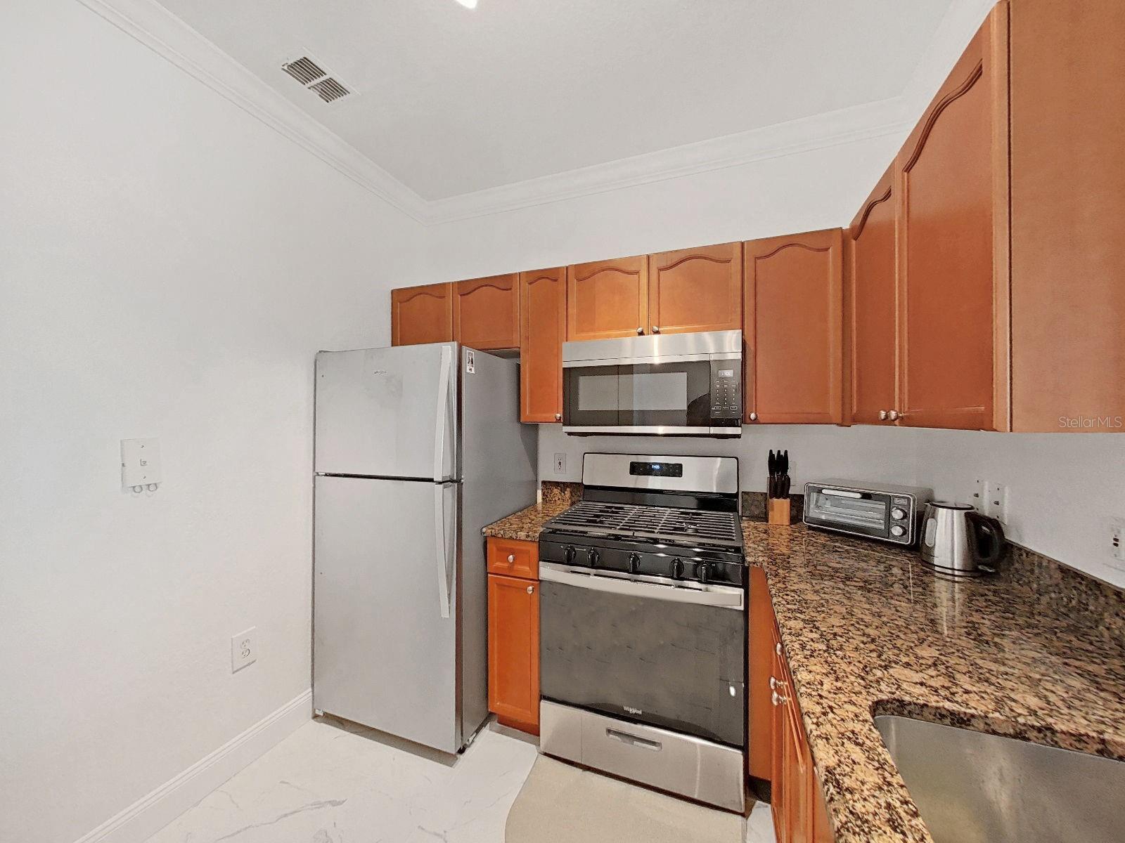 GRAND BELLAGIO AT BAYWATCH CONDO THE - Residential Lease