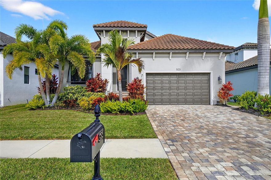 523 Treviso Drive, Apollo Beach, FL 33527 | Gated Waterfront Pool Home | Cul-de-Sac | Dock & Lift | 3 Beds | 2 Baths | 2,333 Sq Ft

523 Treviso Drive, Apollo Beach, FL is a gated waterfront pool home for sale on a quiet cul-de-sac, featuring 3 bedrooms, 2 bathrooms, and 2,333 square feet of energy-efficient living space. Located in a small, private waterfront community, this saltwater canal home offers direct Tampa Bay access with a private covered dock, water and electric service, and a 10,000-lb boat lift—making it an ideal match for a boating family. Residents also enjoy walkable access to a full sports and fitness complex, racquet and pickleball facilities, and Apollo Bistro, which serves breakfast, lunch, and dinner and features simulated golf—delivering a rare blend of gated privacy, active lifestyle, and true boat-ready convenience in Apollo Beach.

The interior is light and welcoming with 10+ foot ceilings and coffered ceilings in the foyer, great room, and primary bedroom. Architectural touches include 8-foot interior and exterior doors, crown molding in the foyer, office, great room, and primary suite, and a built-in dry bar and custom bar area in the main living space—perfect for entertaining after a day on the water. Recent improvements include a new HVAC system with UV light filtration and a new water heater, supporting comfort and indoor air quality year-round.

The gourmet kitchen is designed for both everyday living and hosting, featuring quartz countertops, an oversized double cabinet-depth island, pendant lighting, and 42" staggered upper cabinets finished with crown molding. The premium stainless steel appliance package includes a Wolf 36" induction range, Sub-Zero 30" column refrigerator, 24" column freezer, 18" column wine chiller, and a Bosch dishwasher—bringing true performance and style into the heart of the home.

Outdoor living is where this home truly shines. The covered and screened patio creates a waterfront oasis with a Cat-5 rated powered screen system, an additional dry bar with beverage refrigerator, and a fully equipped outdoor kitchen featuring a Paradise Grill, side burner, and bar-height seating for six. The heated pool is surrounded by pavers and built on a raised reinforced concrete foundation, creating a private retreat designed for both daily enjoyment and weekend gatherings.

This home is built for Florida living with a tile roof, impact-rated garage door, custom roll-down hurricane-rated storm protection screens, hurricane shutters on all windows, and a hurricane-rated garage door. Additional features include a water softener system with reverse osmosis serving the kitchen, refrigerator, and freezer, along with professional landscaping that enhances curb appeal and the backyard setting.

Flood insurance is transferable, and the home has never flooded.

Conveniently located near dining, shopping, schools, Apollo Beach Preserve Park, and the Manatee Viewing Center, with easy access to major highways and downtown Tampa, this gated waterfront residence combines boating lifestyle, walkable amenities, and refined design in one of Apollo Beach’s most desirable settings.