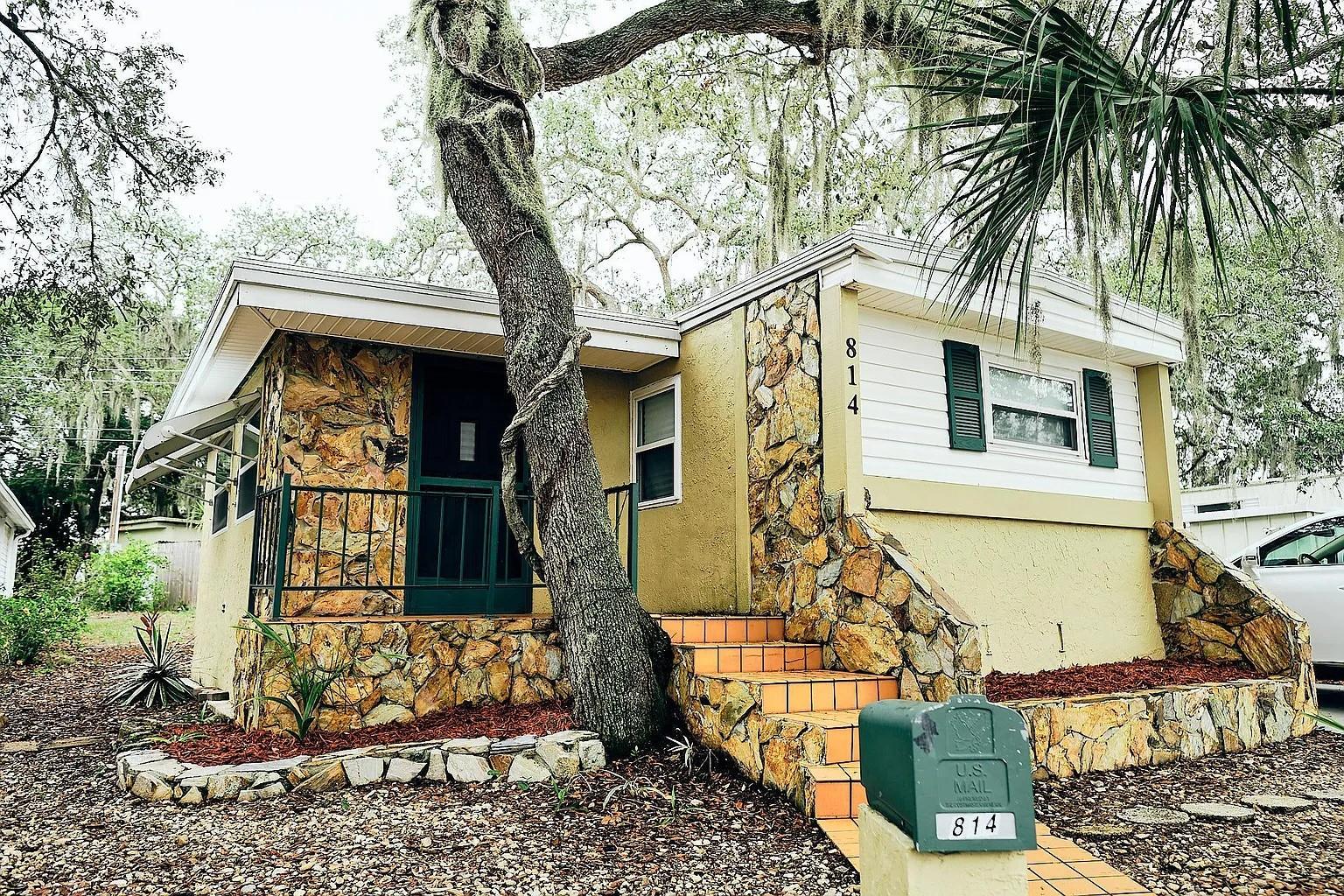 OWN YOUR OWN LAND...Come Live Where Most Vacation! This charming 2-bedroom, 1-bath home offers affordable living in one of the most desirable areas of Pinellas County. Perfectly located near everything you love—bike or walk the Pinellas Trail to Historic Tarpon Springs and the famous Sponge Docks, explore vibrant Palm Harbor, enjoy the charm of downtown Dunedin, and of course, spend your days at the beach! The tree-shaded lot provides a peaceful retreat with a spacious screened, covered lanai, ideal for relaxing evenings after a day of exploring. Updates & Features: Water heater (2020), 50-year roof (2016), All insulated windows (2015). Separate outdoor laundry room This is a property you won’t want to miss—affordable living on a prime location. Measurements are approximately, buyer's agent and buyer to verify. Please use "AS IS" contract. Agent is related to the seller.
