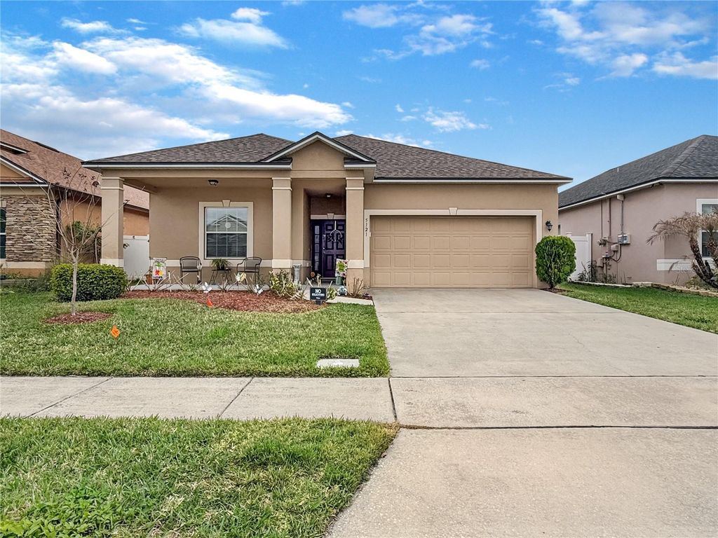 Photo of 5121 Gulf Sturgeon Lane, Saint Cloud, FL 34772 (MLS # O6392328)