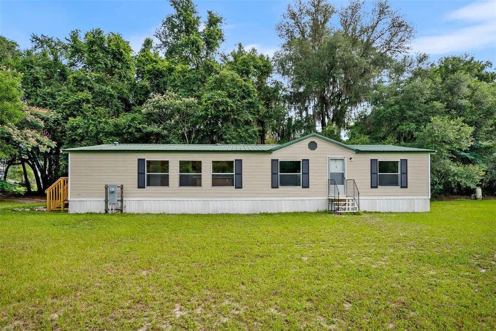Photo of 4296 SE County Road 18, Lake City, FL 32025 (MLS # GC541276)